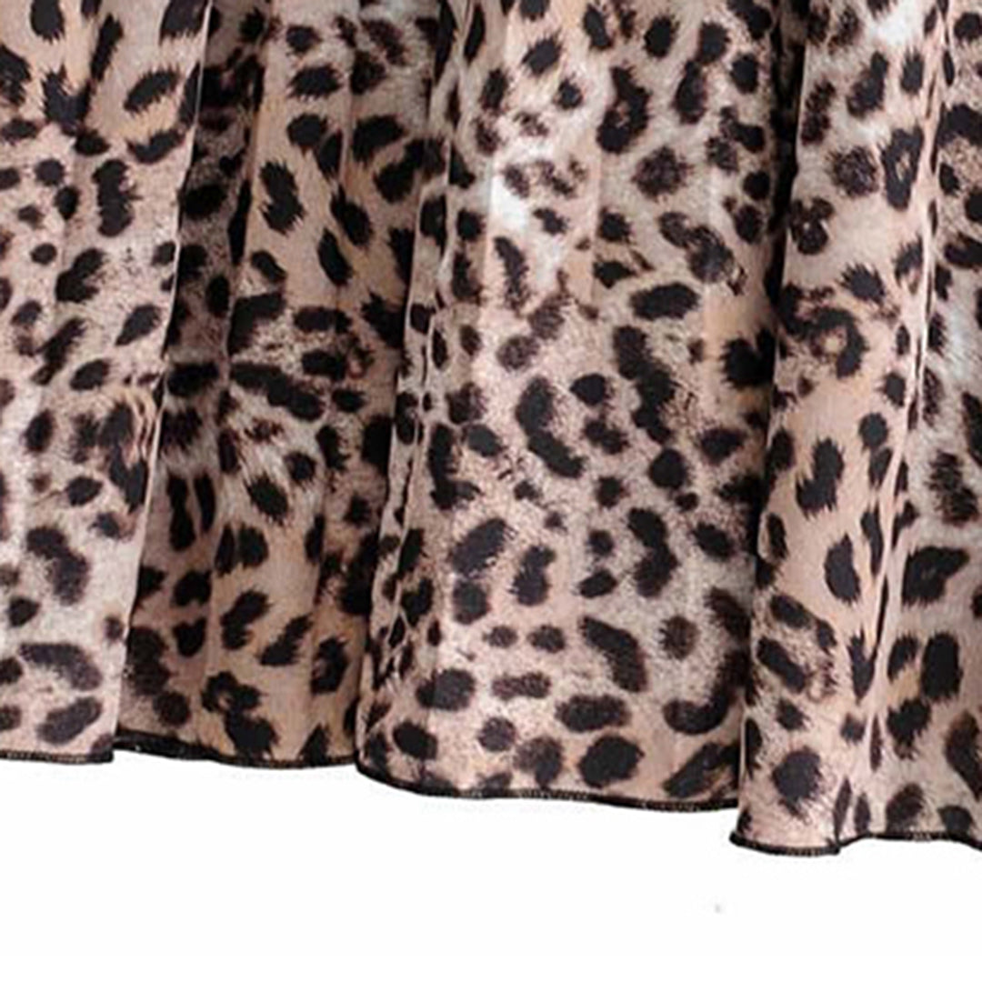 Leopardenmuster Stoff, braun-schwarz, Polyester, für Mode und Dekoration, Nahaufnahme.