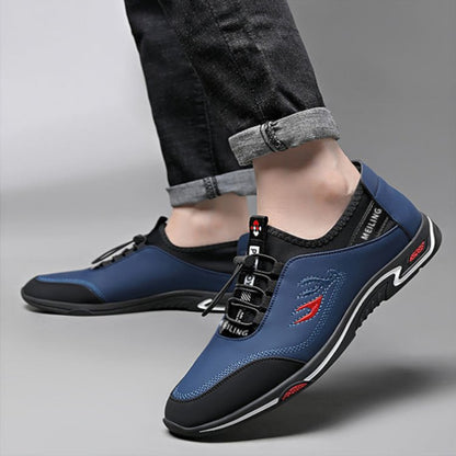 Herren Sneaker, blau-schwarz, sportlich, bequem, modisch, mit rotem Akzent, Freizeitschuh.