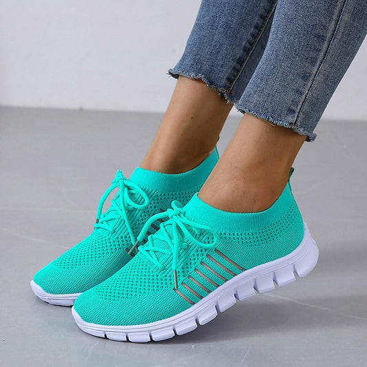 Türkise Damen-Sneaker, atmungsaktiv, rutschfeste Sohle, ideal für Fitness und Sport.