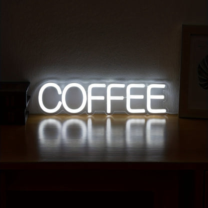 Leuchtendes COFFEE LED-Schild auf Holzoberfläche, dekorative Beleuchtung für Cafés und Küchen.