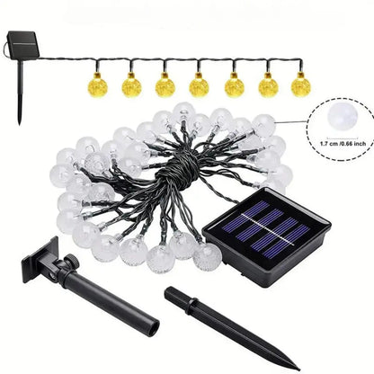 Solarbetriebene Lichterkette, warmweiße LED-Kugeln, für Garten, wetterfest, energiesparend.