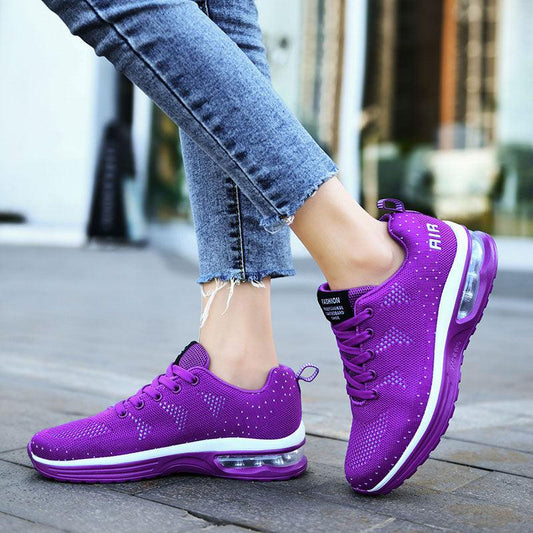 Lila Damen-Sneaker, atmungsaktiv, mit Luftpolstersohle, ideal für Sport und Freizeit.