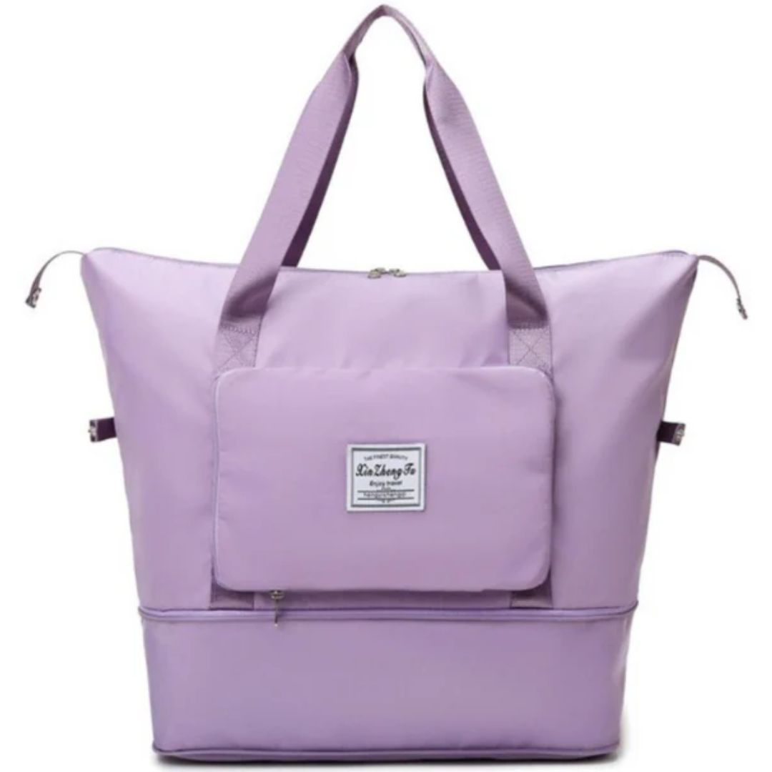 Lila Reisetasche mit Reißverschluss, großer Fronttasche, robustem Stoff, ideal für Reisen.