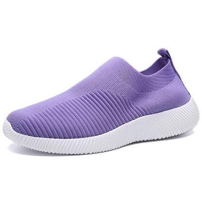 Lila Damen-Sneaker aus Strickstoff, rutschfeste Sohle, bequem, modisch, atmungsaktiv.