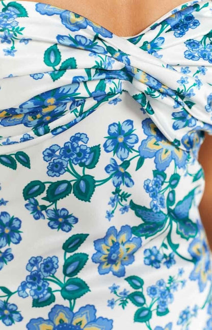 Knytett klänning med blått blommönster – Mireva