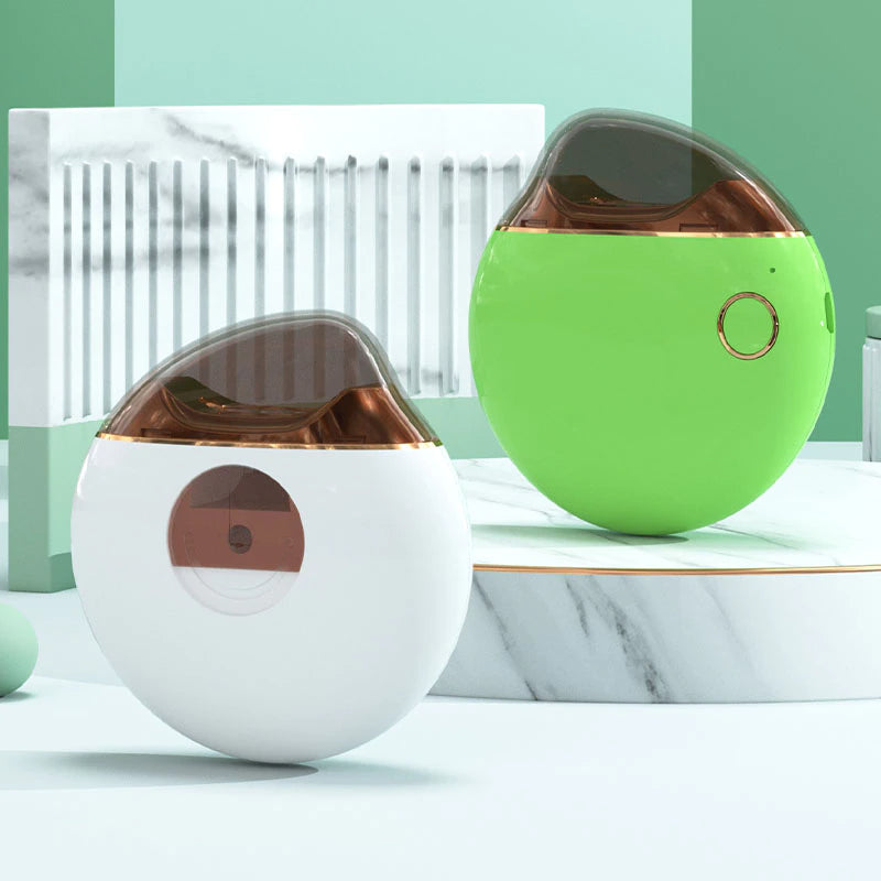 Grüner und weißer Luftbefeuchter, modern, rundes Design, Kunststoff, für Wohnräume.