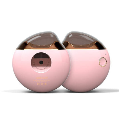 Rosa tragbarer Luftbefeuchter, rundes Design, USB-betrieben, modernes Wohnaccessoire.