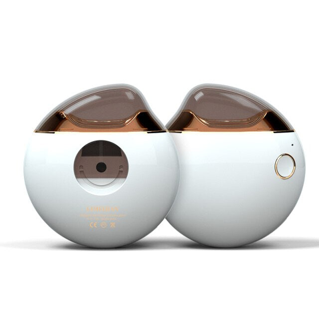 Weißer Luftbefeuchter, rund, mit goldenen Akzenten, modernes Design, tragbar, USB-betrieben.