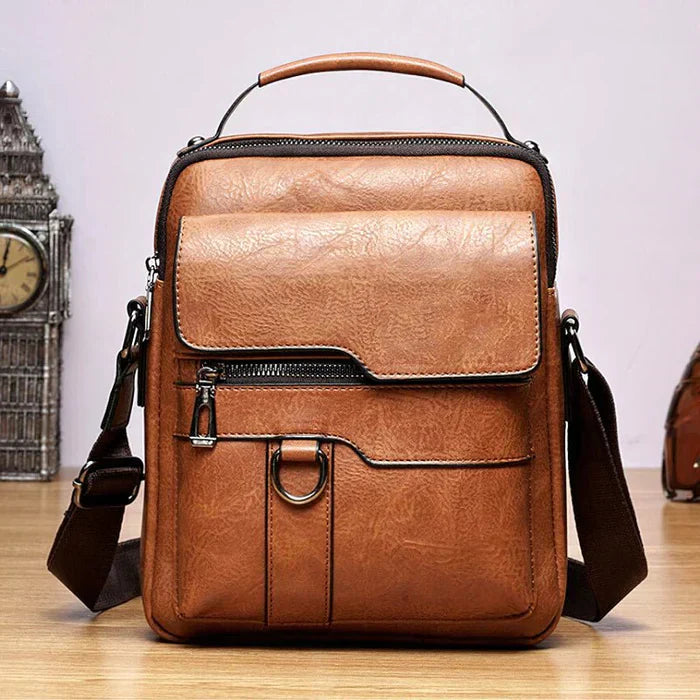 Braune Lederschultertasche, modern, stilvoll, mit Reißverschluss und Taschen, für Herren.