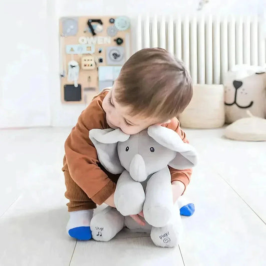 Interaktiv babyelefant med spel- och språkfunktion för småbarn