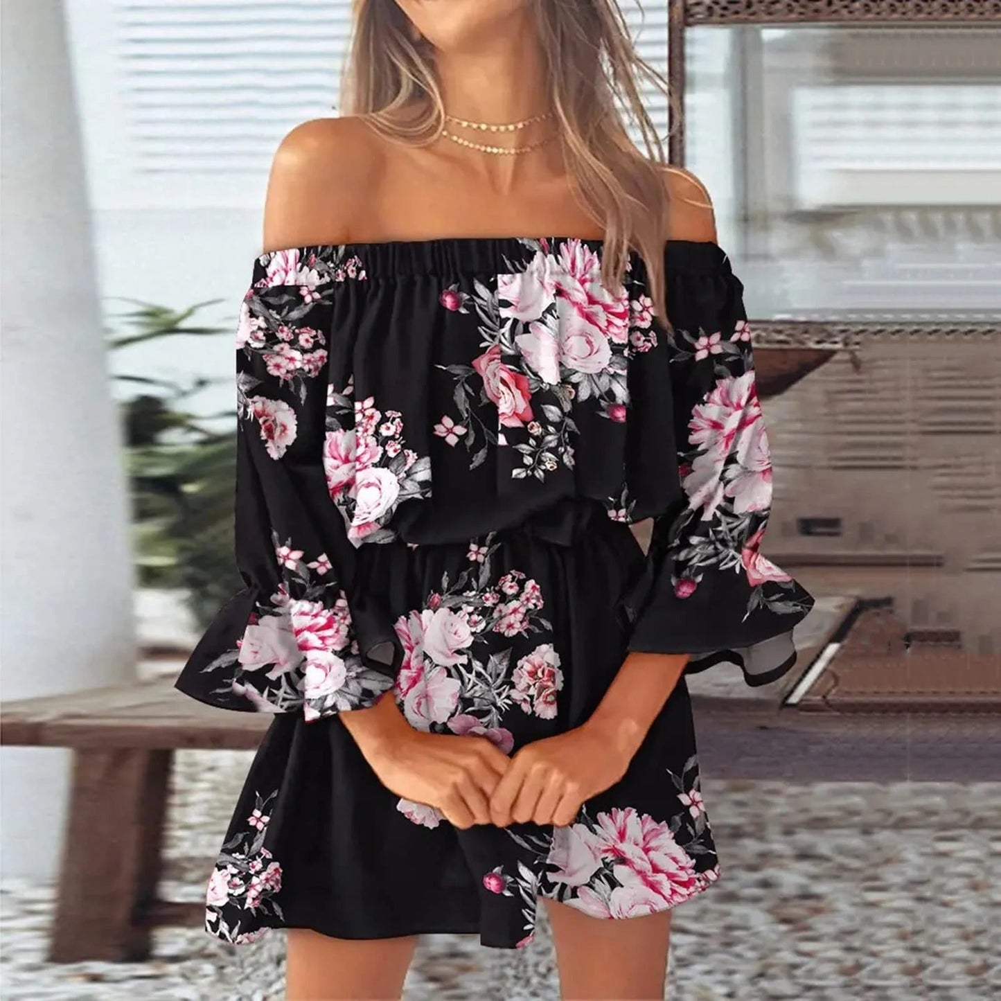 Sommardress med blommönster och utsvängda ärmar – Mireille