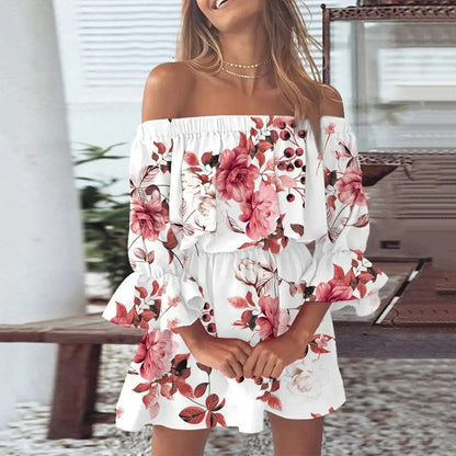 Sommardress med blommönster och utsvängda ärmar – Mireille