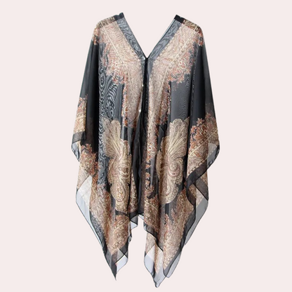 Schwarzer Damen-Poncho mit goldenen Paisley-Mustern, elegantes Design, leichtes Material.