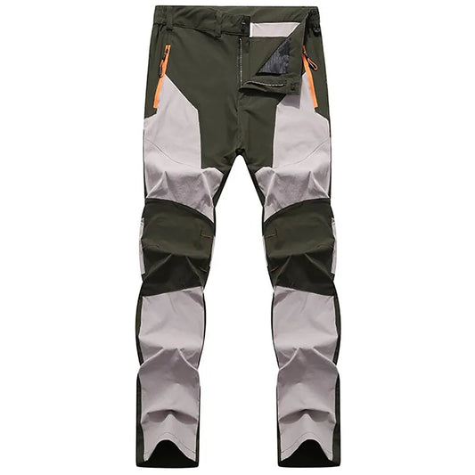 Wasserdichte Outdoor-Hose, grün-grau, mit Reißverschlusstaschen, ideal für Wandern und Trekking.