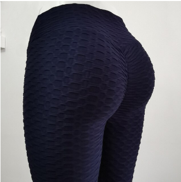 Dunkelblaue, nahtlose Leggings mit Wabenstruktur für Damen, figurbetont und elastisch.