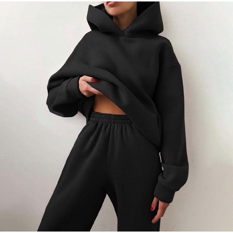 Damen Oversize Trainingsanzug, schwarz, Hoodie und High-Waist Hose, bequem, modisch.