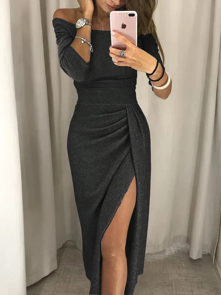 Frau in schwarzem, schulterfreiem Abendkleid mit hohem Schlitz, elegantes Design, Modefotografie.
