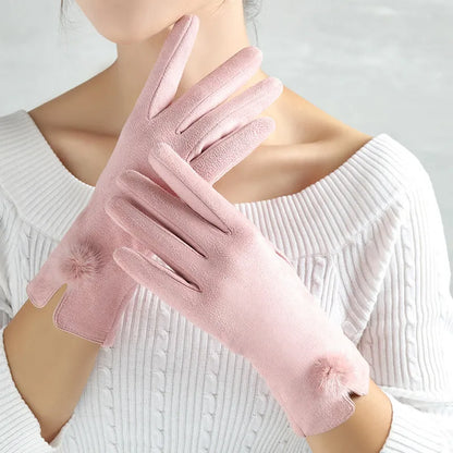 Damenhandschuhe rosa, Wildleder, elegant, warm, Wintermode, mit Pompons, stilvoll, modisch.