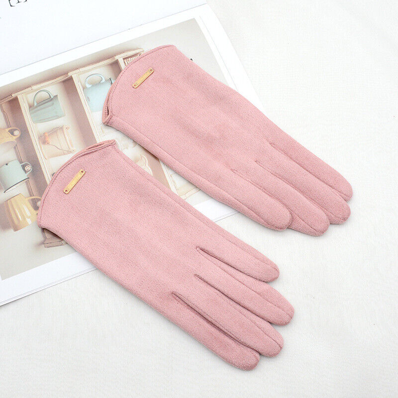 Rosa Damenhandschuhe aus Wildleder, elegant, modisch, Accessoire, Herbstmode, stilvoll.