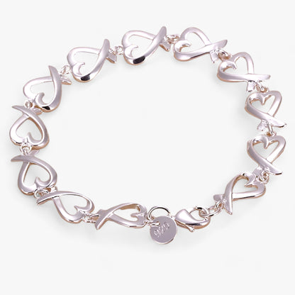 Silbernes Herzarmband, Damen, elegantes Design, Schmuck, Geschenk, modisch, hochwertig