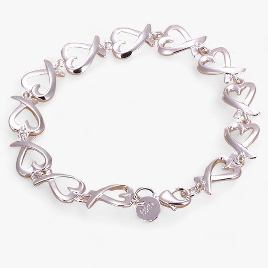 Silbernes Herzarmband, Damen, elegantes Design, Schmuck, Geschenk, modisch, hochwertig