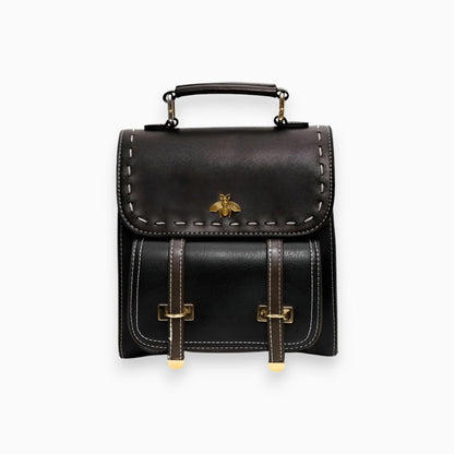 Schwarzer Lederrucksack mit Bienenemblem, modisch, elegant, Damenaccessoire, hochwertig.