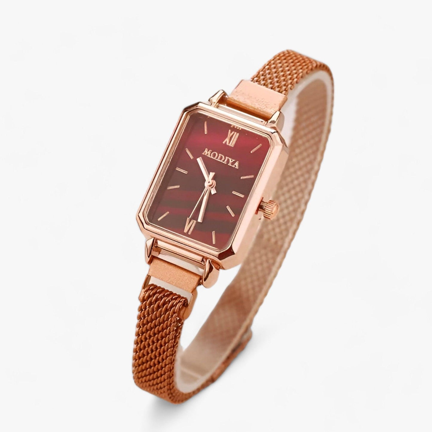 Roségoldene Damenarmbanduhr mit rechteckigem Zifferblatt und Mesh-Armband, elegant und modern.