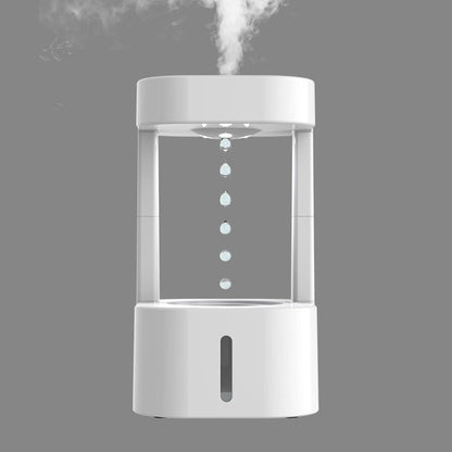 Tragbarer weißer Mini-Luftbefeuchter, modernes Design, ideal für Zuhause oder Büro.