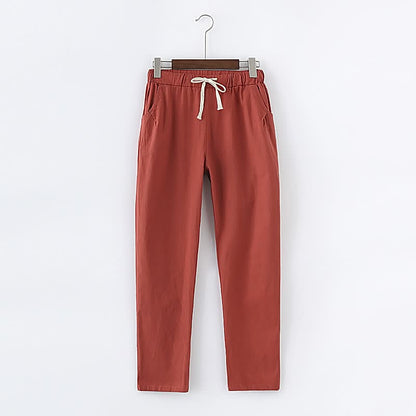 Rote Jogginghose aus Baumwolle mit Kordelzug, bequem und modisch, ideal für Freizeitkleidung.