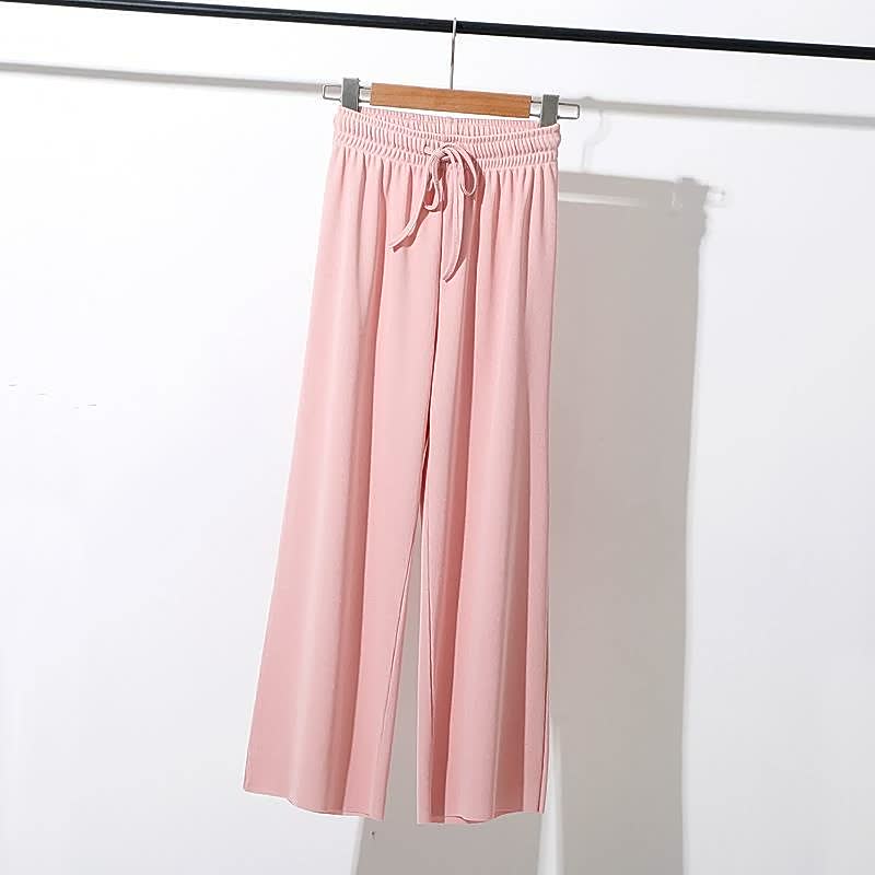 Rosa Damenhose, locker geschnitten, elastischer Bund, modische Freizeithose, bequemes Material.