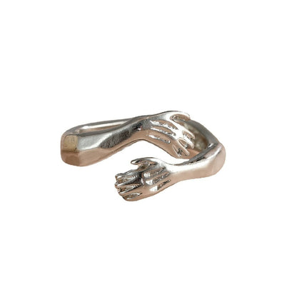Silberner Ring mit Handdesign, modisches Schmuckstück, einzigartiges Accessoire, Geschenkidee.