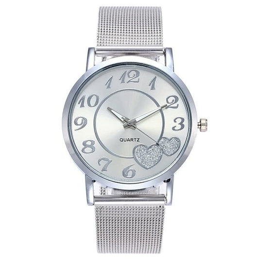 Silberne Damenarmbanduhr mit Herzdesign, Quarzwerk, Metallarmband, modisch, elegant.