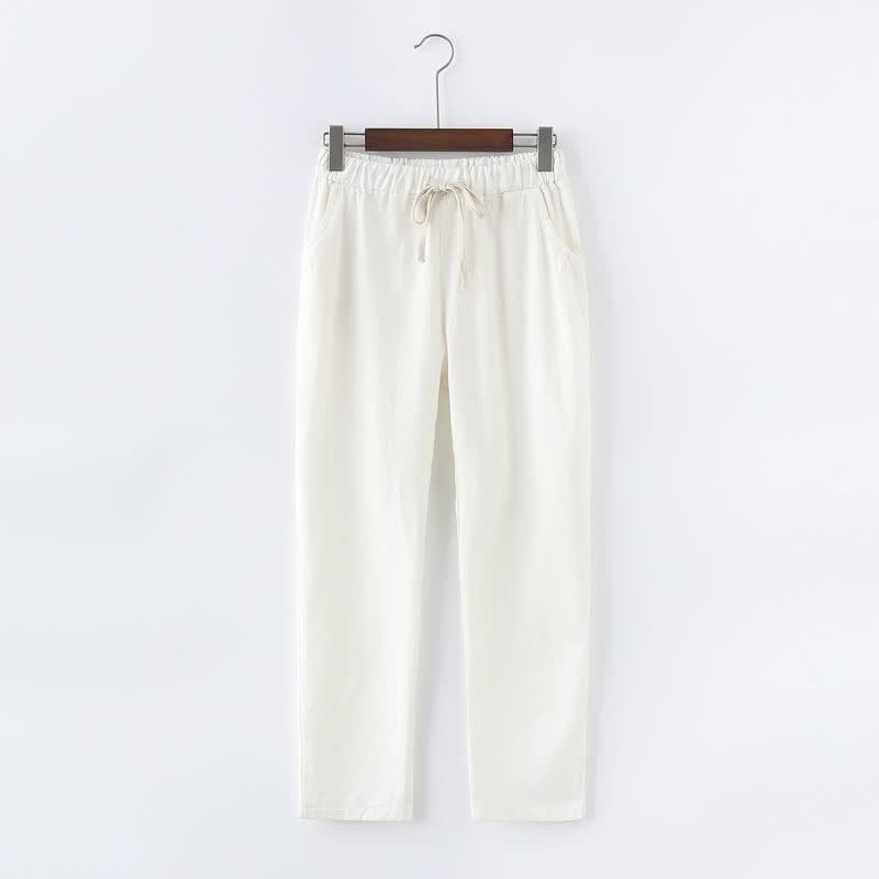 Weiße Baumwollhose mit Kordelzug, lässig, bequem, ideal für Freizeitkleidung.