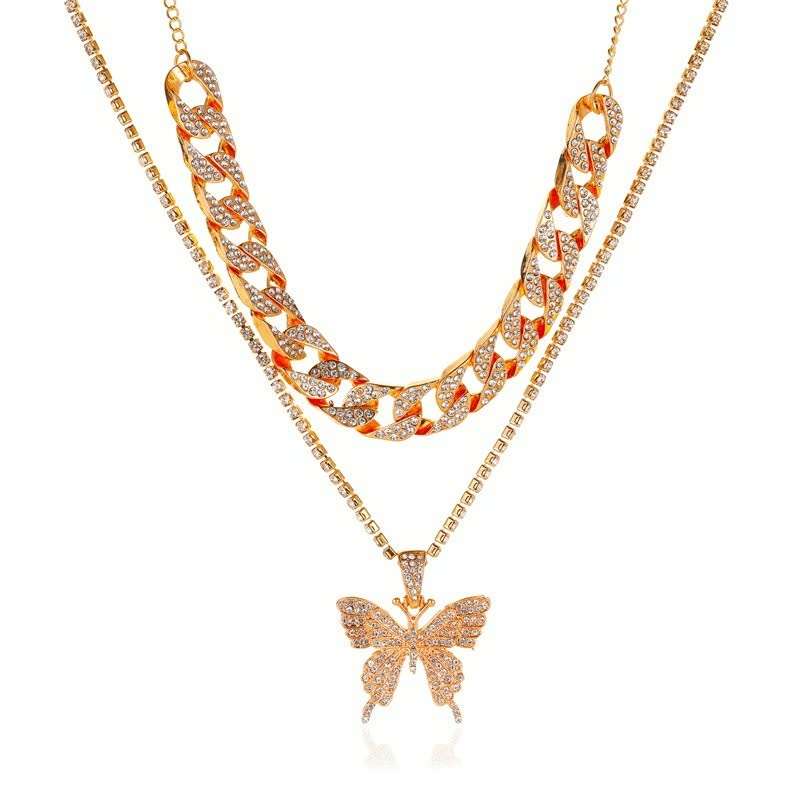 Goldene Halskette mit Schmetterlingsanhänger, Strasssteinen, modisches Schmuckstück, Damenaccessoire.