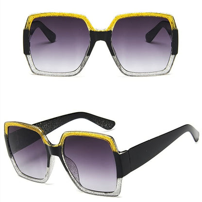Quadratische Sonnenbrille, schwarz-gold, UV-Schutz, modisch, Damenaccessoire, Retro-Stil.