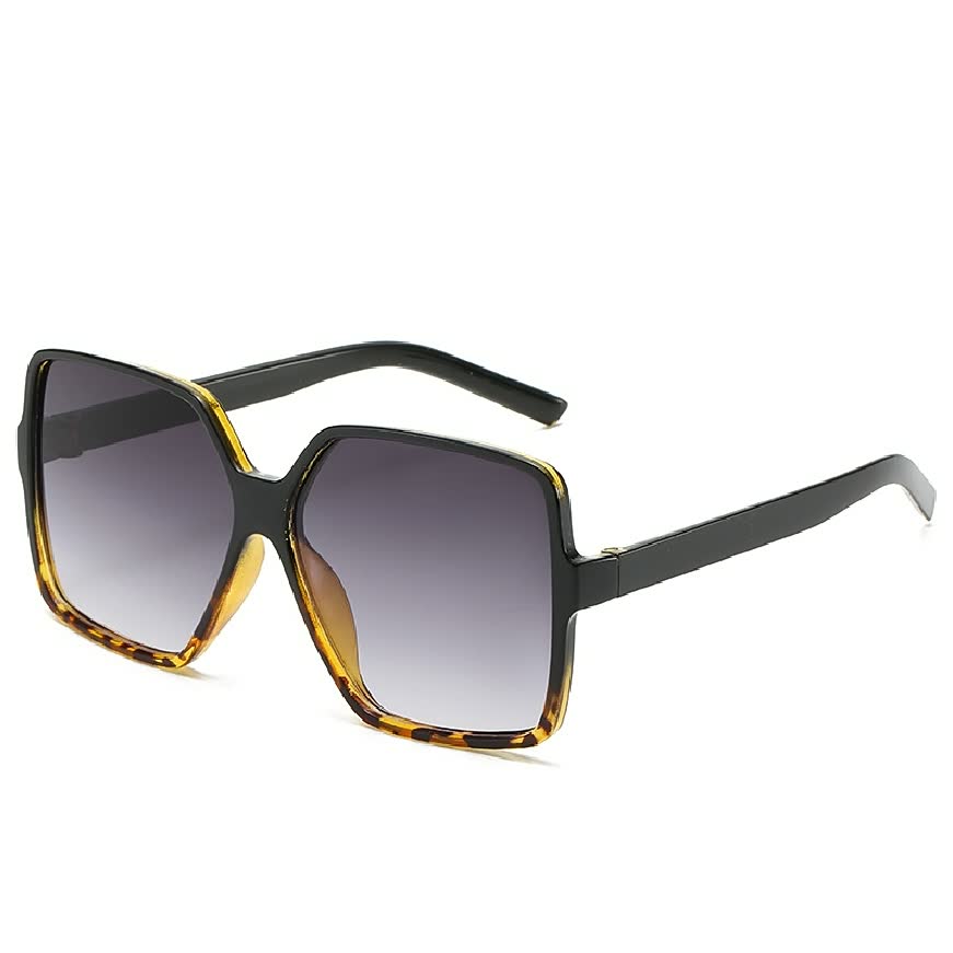 Sonnenbrille Damen, eckig, schwarz-gold, UV-Schutz, modisch, Retro-Design, Accessoire.