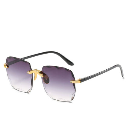 Trendiga randlösa solglasögon med UV400-skydd i vintage-look – Clea