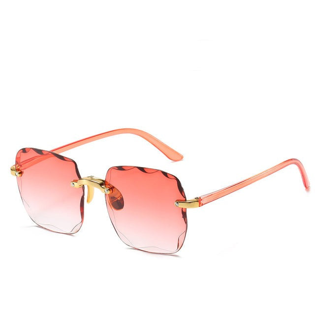 Trendiga randlösa solglasögon med UV400-skydd i vintage-look – Clea