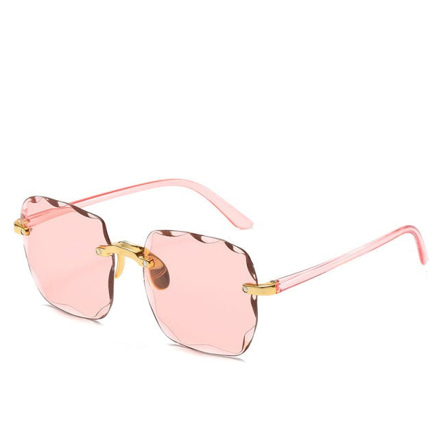 Trendiga randlösa solglasögon med UV400-skydd i vintage-look – Clea