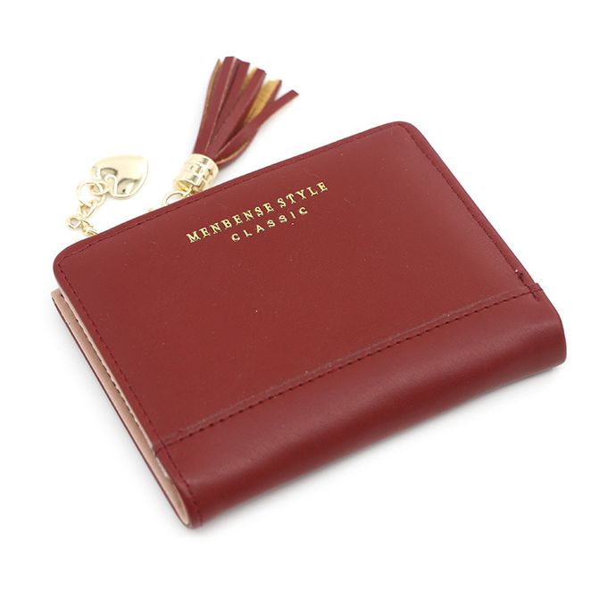 Rote Leder-Geldbörse mit Quaste und Herzanhänger, klassisches Design, Damen-Accessoire.
