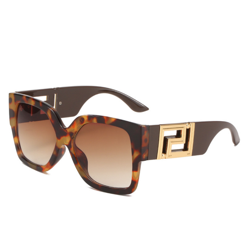 Damen Sonnenbrille, eckig, Schildpattmuster, goldene Details, UV-Schutz, modisch.