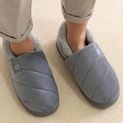 Graue Hausschuhe aus Fleece, warm, gemütlich, rutschfest, ideal für den Winter.