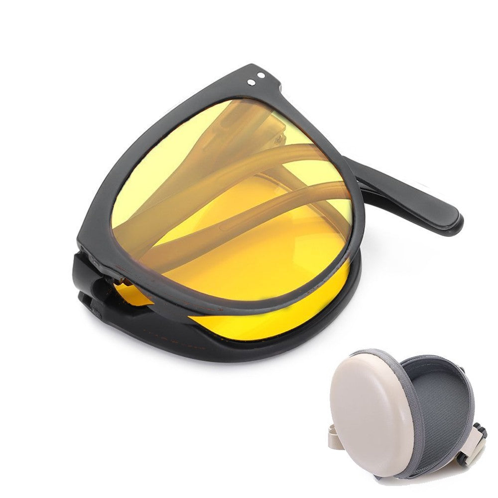 Schwarze Nachtsichtbrille mit gelben Gläsern und Etui, ideal für Autofahren bei Nacht.