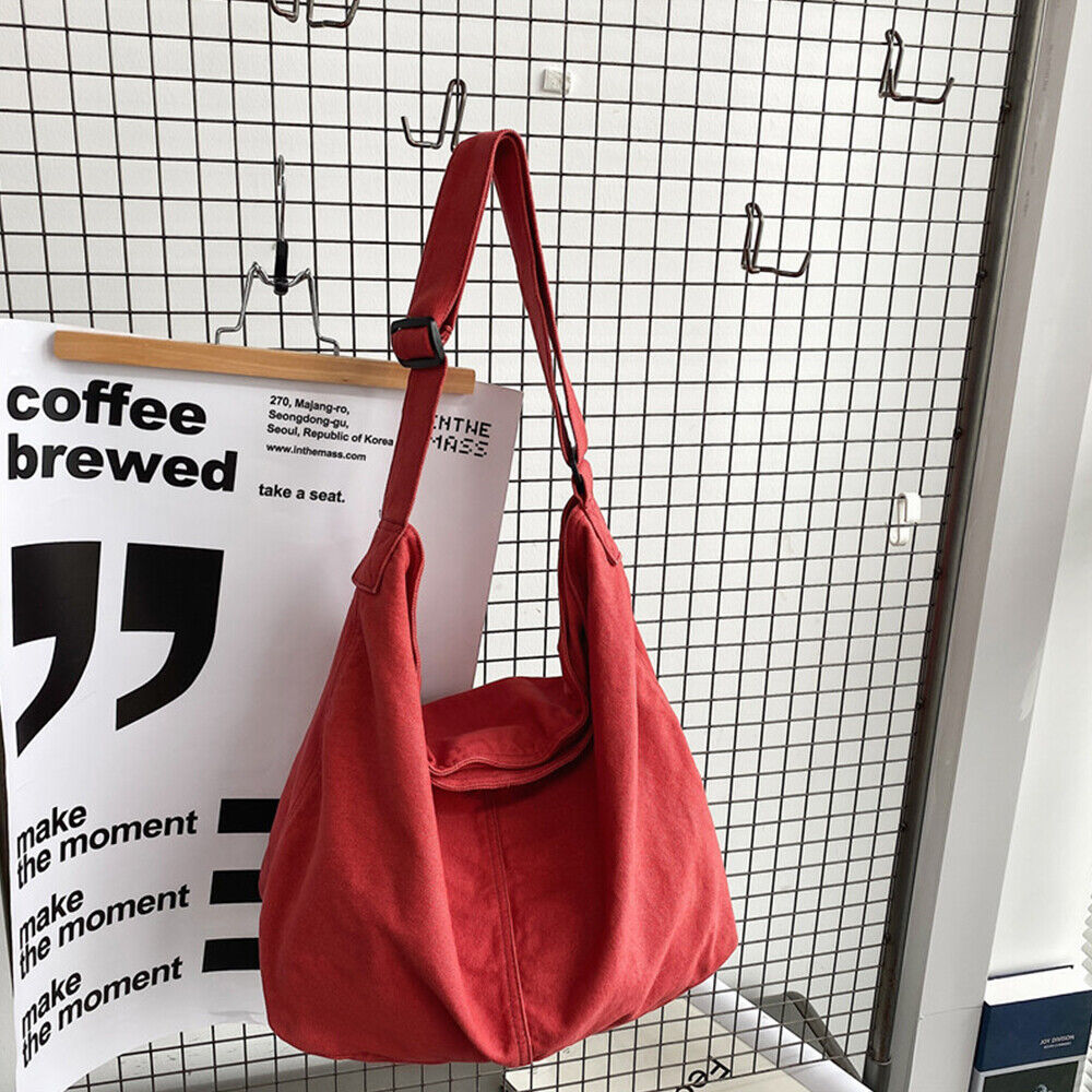 Rote Umhängetasche aus Segeltuch, lässig, modisch, ideal für Alltag und Reisen.