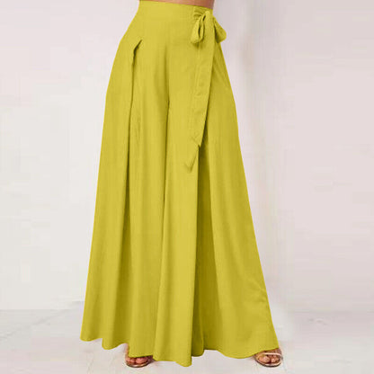Gelbe Damenhose, weites Bein, hoher Bund, Sommermode, eleganter Stil, Bindegürtel.