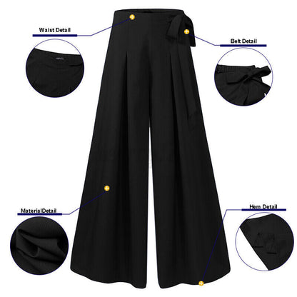 Schwarze Damenhose mit weitem Bein, Taillenband, Materialdetails, modisch, elegant.