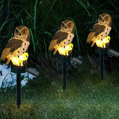 Drei Eulen-Solarleuchten im Garten, leuchtend, wetterfest, dekorativ, energiesparend.