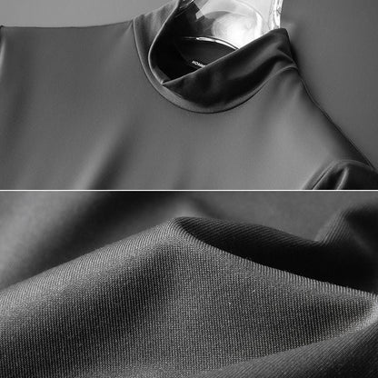 Schwarzes Rollkragen-Shirt aus Baumwolle, Nahaufnahme, weicher Stoff, modisch, elegant.