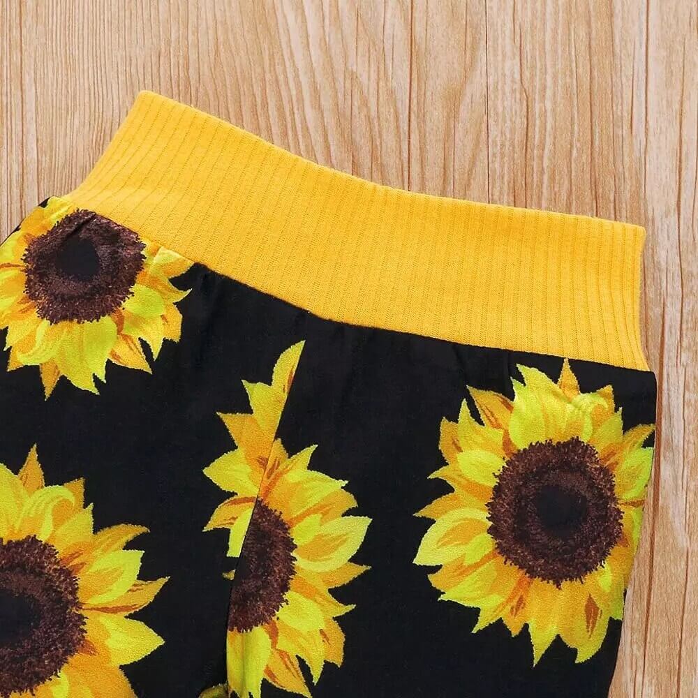 2-delad babyoutfit med solrosmönster – SolLeende