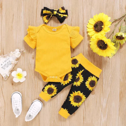 2-delad babyoutfit med solrosmönster – SolLeende